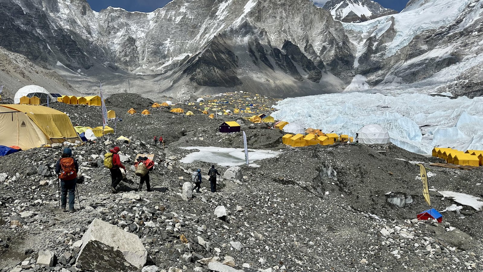 Everest Base Camp itself: a mile-long sprawl of tents, rocks, and dirt sitting on a glacier